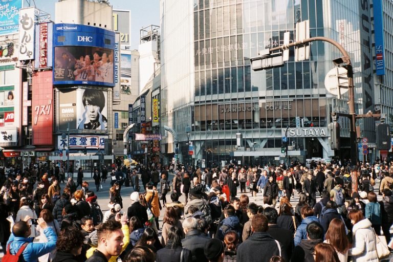 Crowded Tokyo commute reflecting collective order