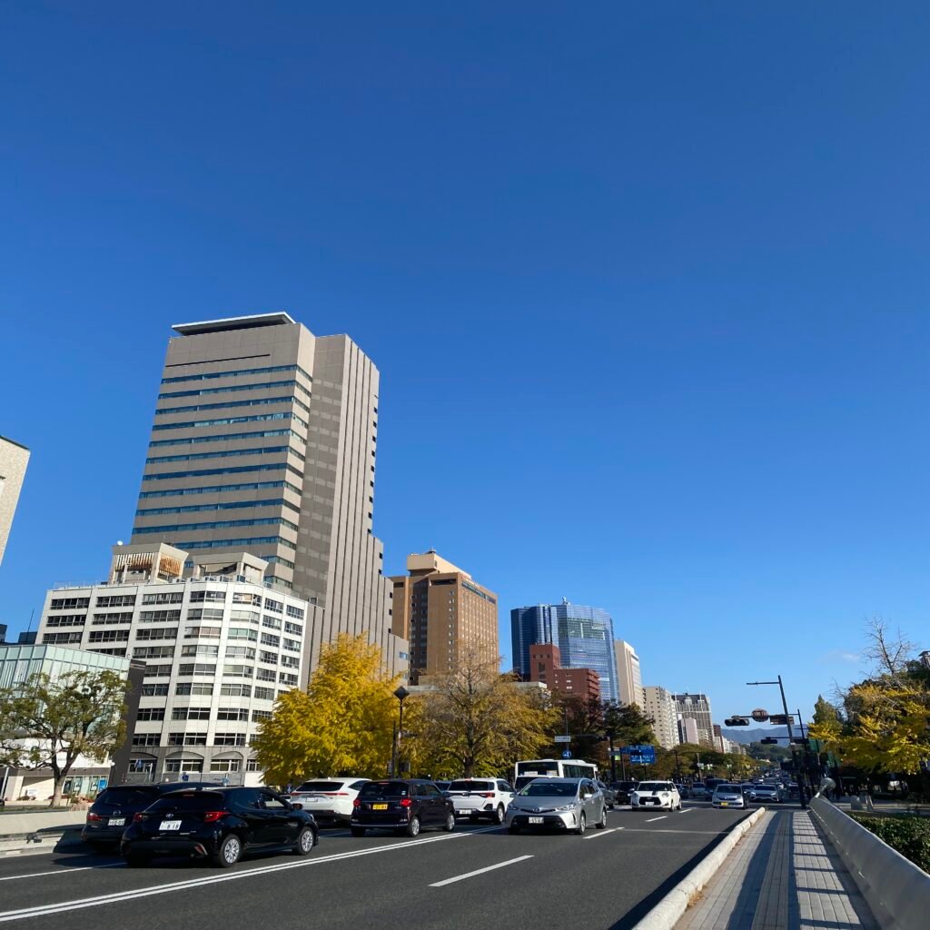 Tram passing through Hiroshima residential streets